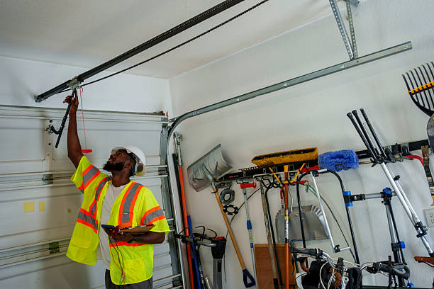 Professional Garage Door Roller Replacement technician working in Osgood, IN